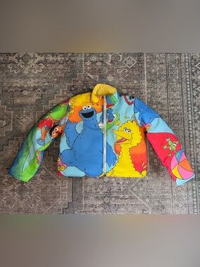 Colorful Sesame Street Puffer Jacket featuring Cookie Monster & Big Bird